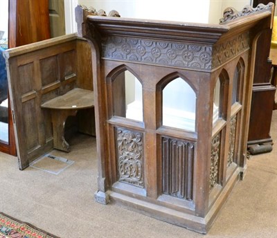 Lot 1654 - A Victorian carved oak corner lectern, by repute from St Oswald's Church, Hauxwell, North...