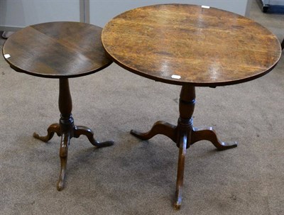 Lot 1660 - An 18th century circular tripod table, raised on three cabriole legs with flatten pad feet,...