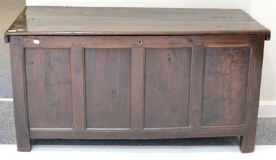 Lot 1677 - ^ An early 18th century oak joined chest with hinged lid above four fielded panels, raised on style