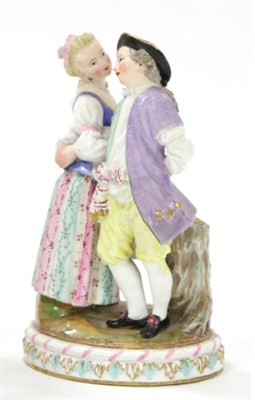 Lot 1 - A Meissen Porcelain Figure Group, circa 1900, as an 18th century boy and girl dancing arm-in-arm on
