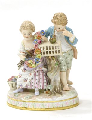 Lot 2 - A Meissen Porcelain Figure Group, circa 1900, depicting a boy and girl in 18th century costume...