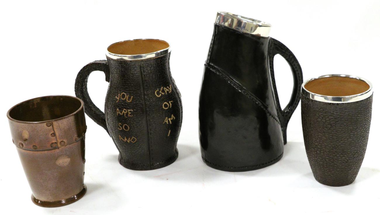 Lot 8 - A Silver Mounted Doulton Slater's Patent Ewer, London 1932, in the form of a leather blackjack,...