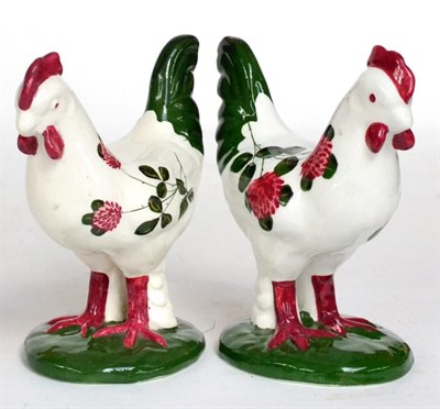 Lot 30 - ~ A Pair of Plichta Pottery Models of Hens, 20th century, painted with flowers, printed marks,...
