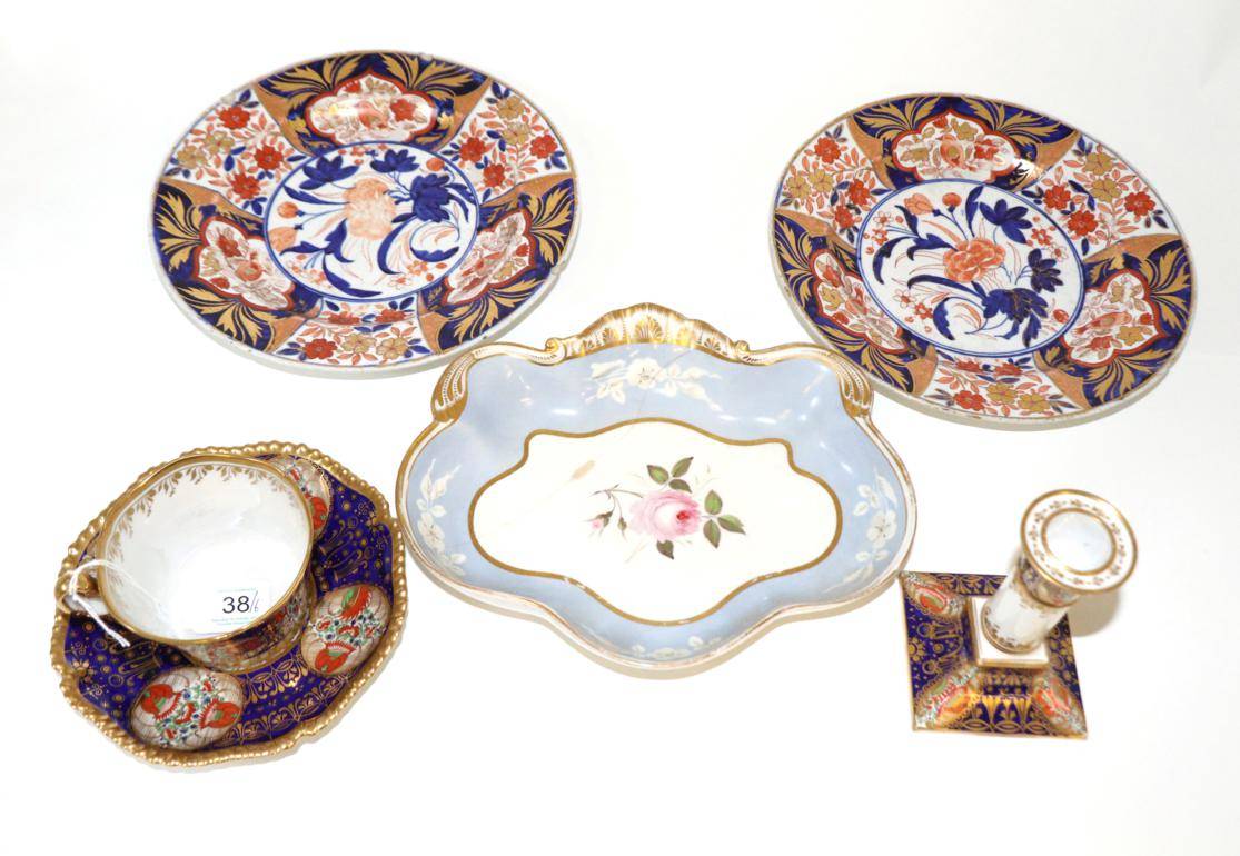 Lot 38 - A Worcester Porcelain Coffee Cup and Saucer, circa 1810, painted with kakiemon style flowers in...