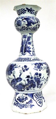 Lot 55 - A Delft Vase, 18th century, of panelled baluster form, painted in blue with chinoiserie foliage...