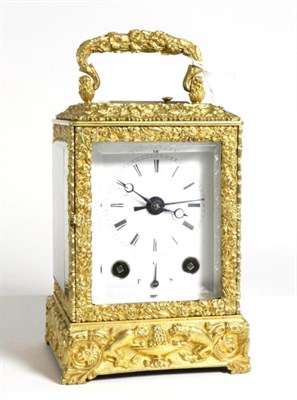 Lot 117 - An Unusual Brass Grande Sonnerie Alarm Carriage Clock, circa 1850, case highly elaborate with...