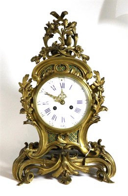 Lot 118 - An Ormolu Bronze Striking Mantel Clock with Garniture, circa 1880, elaborate case with scroll...