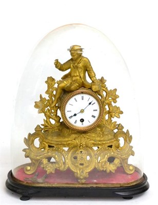 Lot 122 - ~ A Gilt Metal Mantel Timepiece, circa 1890, surmounted by a gentleman in costume, floral and...