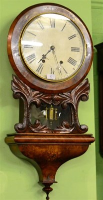 Lot 131 - A Walnut Veneered Drop Dial Striking Wall Clock, circa 1880, leaf carved trunk with a central...