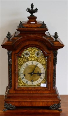 Lot 132 - A German Walnut Chiming Table Clock, circa 1890, arched caddied pediment, applied scroll and...