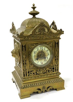 Lot 133 - A Gilt Metal Striking Mantel Clock, circa 1900, domed pediment with a central finial, side...