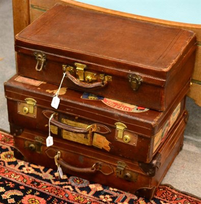 Lot 197 - Two Vintage Brown Leather Travel Cases, 56cm wide; and Another Example, with various travel...