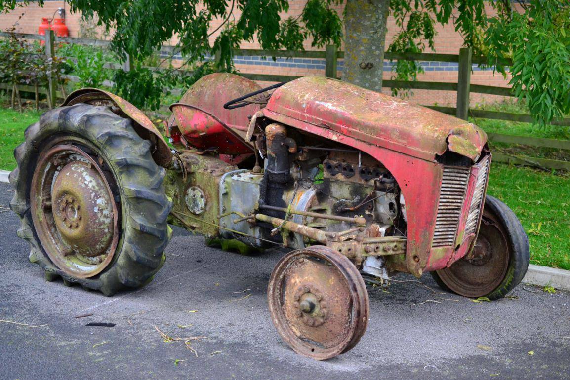 Lot 1162 - Ferguson TE20 Four Cylinder TVO Petrol Parafin Tractor, painted red  (a/f)  The Ferguson TE20 is an