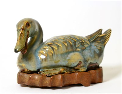 Lot 3 - A Chinese Turquoise Glaze Model of a Duck, in Song style, naturalistically modelled recumbent, 20cm