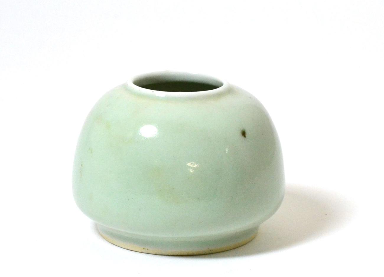Lot 13 - A Chinese Celadon Glazed Brush Pot, Qing Dynasty, of ovoid form, 6cm high