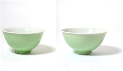 Lot 14 - A Chinese Celadon Glazed Bowl, Qing Dynasty, with slightly everted rim, four character mark in...