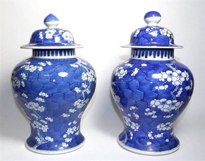 Lot 42 - A Matched Pair of Chinese Porcelain Baluster Jars and Covers, late 19th century, painted in...