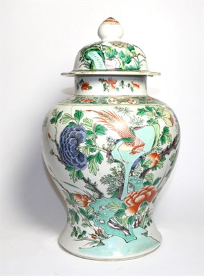 Lot 43 - A Chinese Porcelain Baluster Jar and Cover, late 19th century, painted in famille rose enamels with
