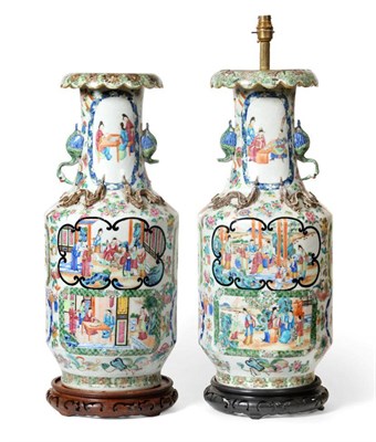 Lot 48 - A Pair of Cantonese Porcelain Rouleau Vases, 19th century, the trumpet necks applied with beast...