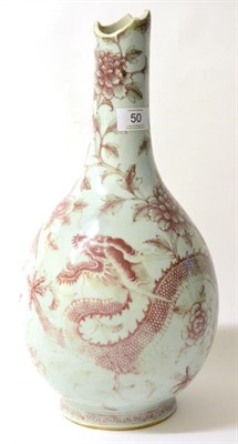 Lot 50 - A Chinese Porcelain Bottle Vase, probably 18th century, painted in underglaze red with a dragon and