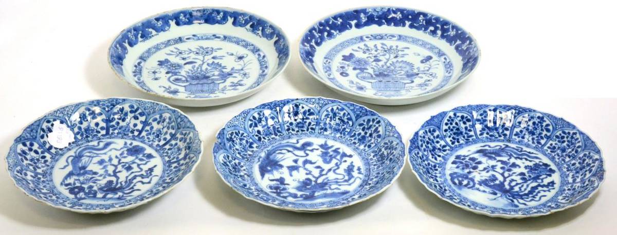 Lot 60 - A Set of Three Chinese Porcelain Saucer Dishes, Kangxi, painted in underglaze blue with exotic...