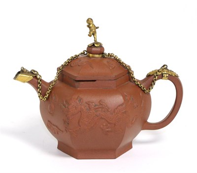 Lot 69 - A Gilt Metal Mounted Yixing Red Stoneware Teapot and Cover, 18th century, of hexagonal form moulded