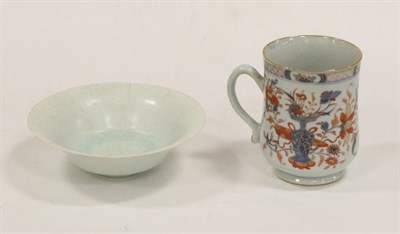 Lot 71 - A Chinese Imari Tankard, circa 1730, of baluster form painted with vases of flowers, 17cm high; and