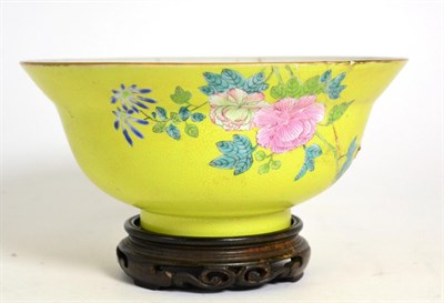 Lot 73 - A Chinese Porcelain Bowl, Qing Dynasty, with everted rim, painted in famille rose enamels with...