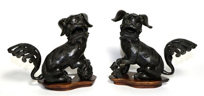 Lot 86 - A Pair of Chinese Bronze Figures of Dogs of Fo, late 19th century, typically modelled seated,...