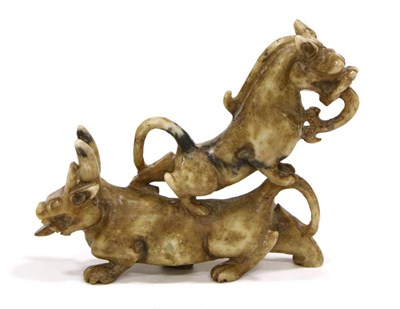 Lot 88 - A Chinese Soapstone Group, Qing Dynasty, modelled as two mythical beasts, 15cm long