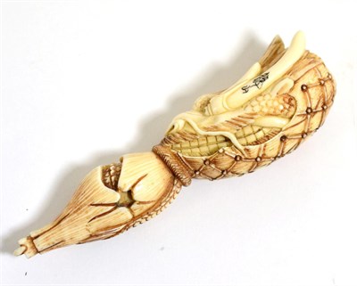 Lot 102 - A Japanese Ivory Netsuke, signed Seizan, Meiji period, as a dragon emerging from a gourd, 10cm long