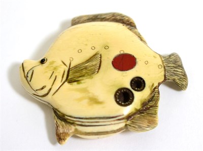 Lot 105 - A Japanese Ivory Netsuke, signed Tomoichi, Meiji period, as a flat fish, 6cm long