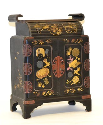 Lot 120 - A Japanese Lacquer Table Cabinet, Meiji period, of pagoda form, the two doors enclosing an...