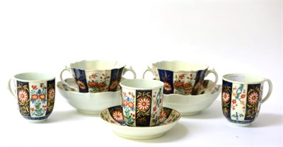 Lot 121 - A Set of Three Worcester Porcelain Coffee Cups and A Saucer, circa 1775, painted with the Rich...