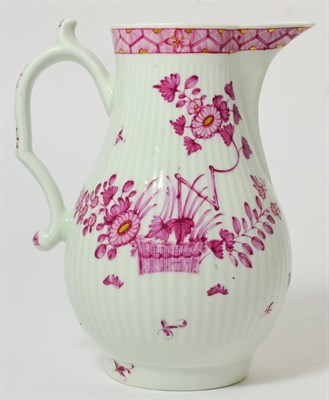Lot 123 - A Worcester Porcelain Fluted Jug, circa 1770, with scroll handle, painted in puce monochrome...