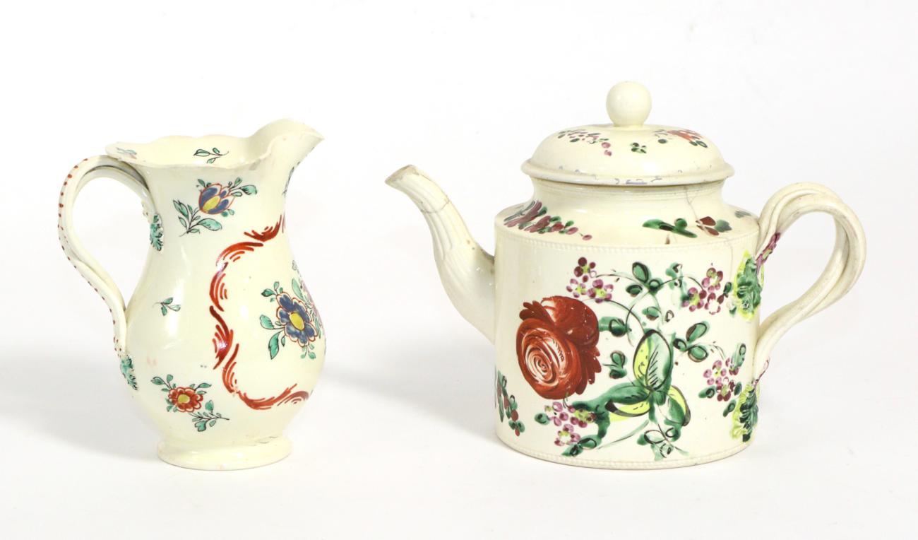 Lot 136 - A Creamware Teapot and Cover, circa 1770, of cylindrical form with entwined handles, painted...
