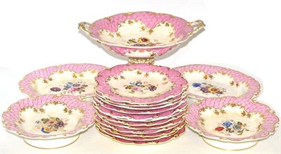 Lot 145 - A Staffordshire Porcelain Dessert Service, circa 1830, painted with flowersprays within pink diaper
