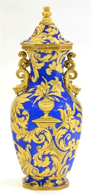 Lot 154 - An Ironstone Alcove Vase and Cover, circa 1830, of octagonal baluster form with dolphin knop...