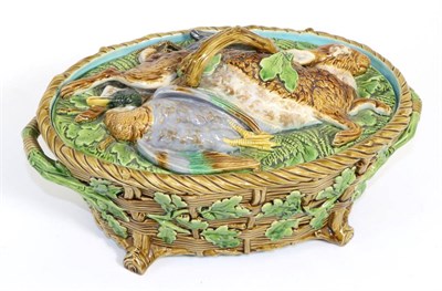 Lot 170 - A Minton Majolica Game Pie Dish and Cover, date mark for 1866, of basket moulded form, the...