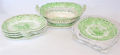 Lot 172 - A Davenport Earthenware Dessert Service, circa 1840, printed in green with a birds amongst...
