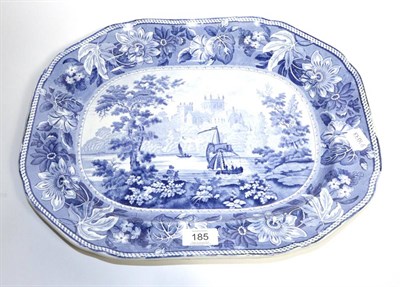 Lot 185 - A Pearlware Platter, circa 1830, of canted rectangular form, printed in underglaze blue with a view