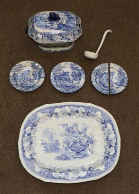 Lot 198 - A Pearlware Meat Platter, circa 1840, with gravy well, printed in underglaze blue with the...