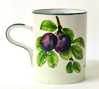 Lot 206 - A Wemyss Pottery Cylindrical Mug, early 20th century, painted with fruiting plum branches,...