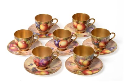 Lot 218 - A Matched Set of Seven Royal Worcester Porcelain Miniature Coffee Cups and Saucers, painted by...