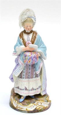 Lot 239 - A Meissen Porcelain Figure of a Lady, circa 1900, wearing a lace hat and lace trimmed dress holding