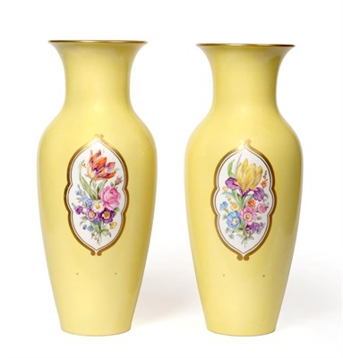 Lot 246 - A Pair of Berlin Porcelain Baluster Vases, circa 1900, with flared necks, painted with sprays...