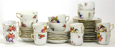 Lot 257 - A Herend Porcelain Tea and Coffee Service, 20th century, painted with fruit and flowers within...