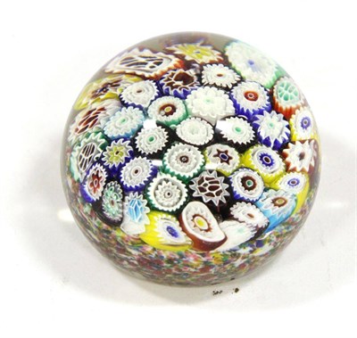 Lot 273 - A Millefiore Glass Paperweight, containing various canes, 8cm diameter