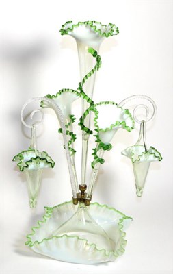 Lot 283 - A Green Vaseline Glass Epergne, with frilled rims, the central trumpet vase flanked by two...