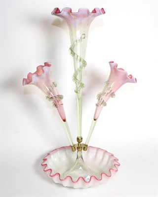 Lot 284 - A Pink Vaseline Glass Epergne, with frilled rim, the central trumpet vase flanked by two...